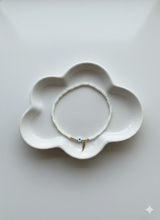 Pulsera Divine Feather: Protección con Estilo 🧿🪽